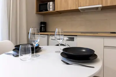 Una cocina o zona de cocina en Apartamentos Turísticos DE LA BERNARDA