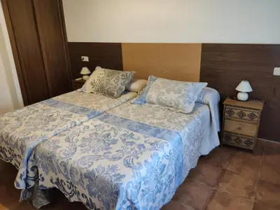 Cama o camas de una habitación en El Rincón de los Riveros