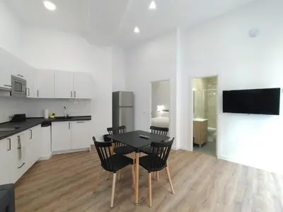 Una cocina o zona de cocina en Apartamentos Vacceas by gaiarooms