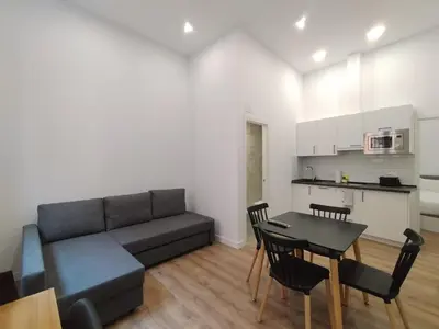 Una cocina o zona de cocina en Apartamentos Vacceas by gaiarooms