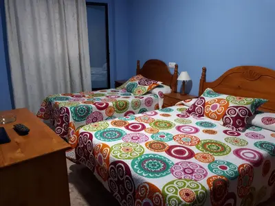 Cama o camas de una habitación en Hostal Julio