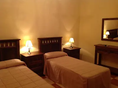 Cama o camas de una habitación en Hotel Julio