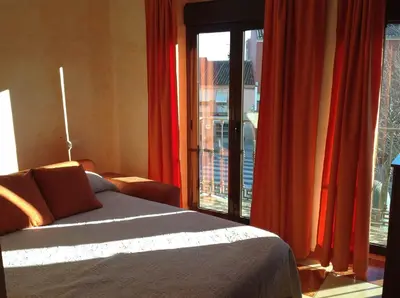 Cama o camas de una habitación en Hotel Julio