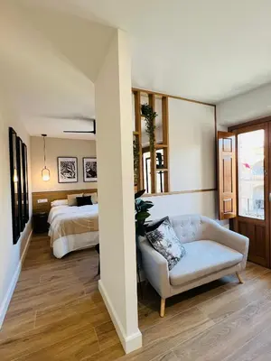 Cama o camas de una habitación en VuT. El Balcón de la Plaza - B.