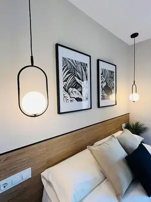 Cama o camas de una habitación en VuT. El Balcón de la Plaza - B.