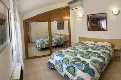 Cama o camas de una habitación en Atico Mirador del Piélago