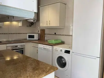 Una cocina o zona de cocina en Atico Mirador del Piélago