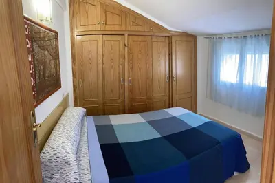 Cama o camas de una habitación en Atico Mirador del Piélago