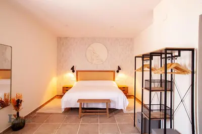 Cama o camas de una habitación en Hotel Rural el Turuñuelo