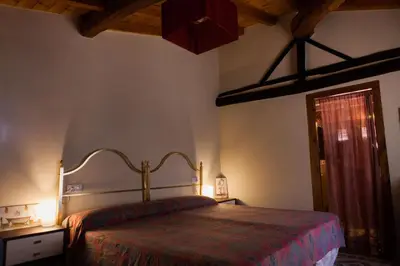 Cama o camas de una habitación en casa rural La Morucha de Hervás