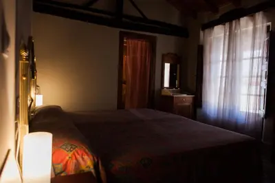 Cama o camas de una habitación en casa rural La Morucha de Hervás