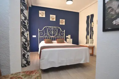 Cama o camas de una habitación en Hostería El Bodegón De Gredos
