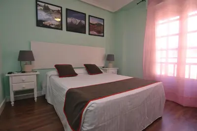 Cama o camas de una habitación en Hostería El Bodegón De Gredos
