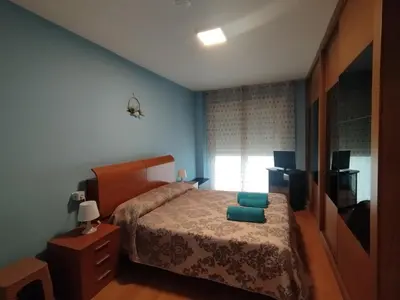 Cama o camas de una habitación en Apartamento Alhondiga Hervás