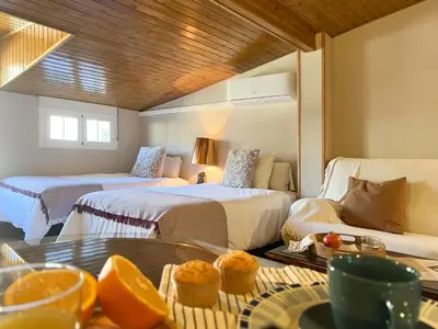 Cama o camas de una habitación en Alojamientos Abuelo Teófilo - Valle del jerte