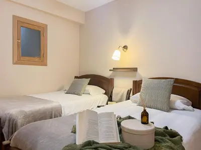 Cama o camas de una habitación en Alojamientos Abuelo Teófilo - Valle del jerte