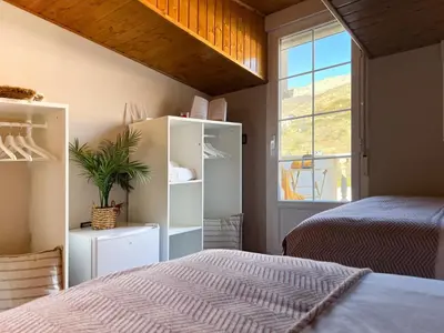 Cama o camas de una habitación en Alojamientos Abuelo Teófilo - Valle del jerte