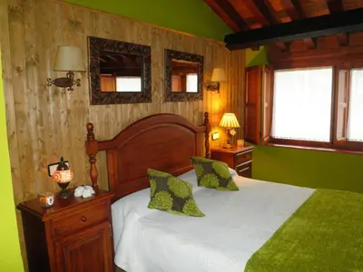 Cama o camas de una habitación en El Alamo. Azagalla Rural