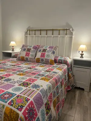 Cama o camas de una habitación en Piso Los Jardines