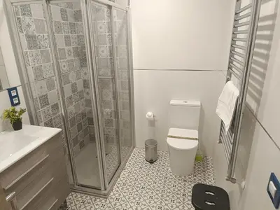 Un baño de Al-Qazeres Suites