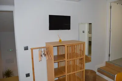 Una televisión o centro de entretenimiento en Casa Rural Casamanín