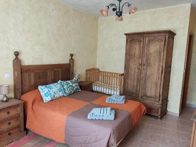 Cama o camas de una habitación en Casa Rural El Pajar Navaluenga