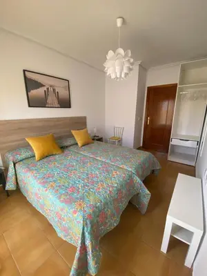Cama o camas de una habitación en Puerta del Sol - Plasencia