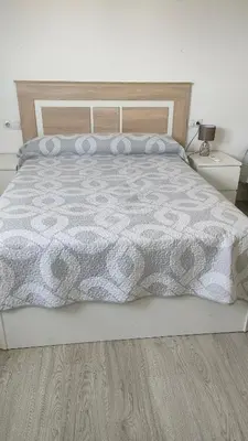 Cama o camas de una habitación en Apartamentos NayDa N4 de 2 habitaciones