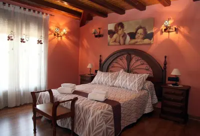 Cama o camas de una habitación en El Torreón del Búho