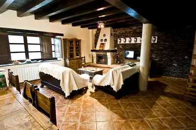 Cama o camas de una habitación en Casa Rural Aquilamas