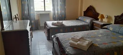 Cama o camas de una habitación en Sol Poniente