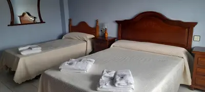 Cama o camas de una habitación en Sol Poniente