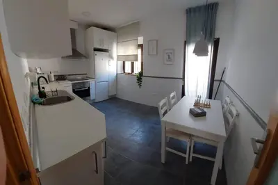 Una cocina o zona de cocina en Apartamentos Entreteatros, fantástico duplex casco histórico