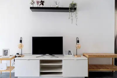 Una televisión o centro de entretenimiento en Apartamentos Entreteatros, fantástico duplex casco histórico