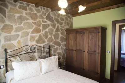 Cama o camas de una habitación en Casas Rurales El Caminante