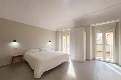Cama o camas de una habitación en Hostal Pompeya Merida