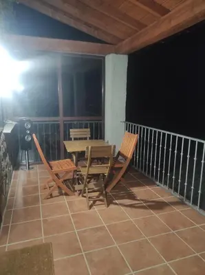 Un balcón o terraza de La casa de la parcela