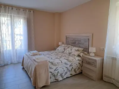 Cama o camas de una habitación en EL CHORRITO