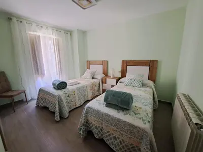Cama o camas de una habitación en EL CHORRITO