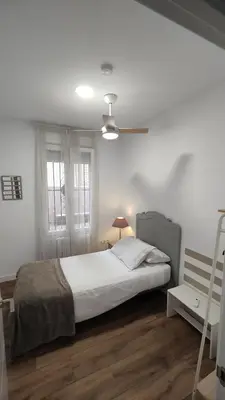 Cama o camas de una habitación en Amplio alojamiento centro barrio del Oeste