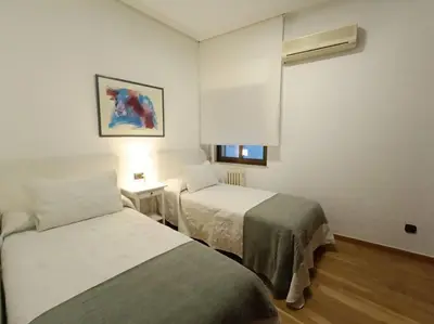 Cama o camas de una habitación en Alojamiento Pl del Ángel junto Pl Mayor con aire