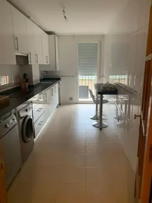 Una cocina o zona de cocina en Alba de Tormes Salamanca Piso de 2 habitaciones 3 camas