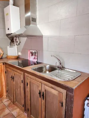 Una cocina o zona de cocina en Apartamentos El Mirador
