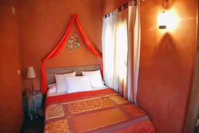 Cama o camas de una habitación en Apartamentos El Mirador