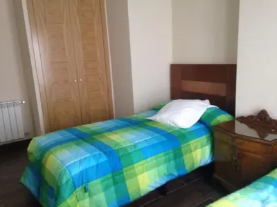 Cama o camas de una habitación en La plazuela Navaluenga