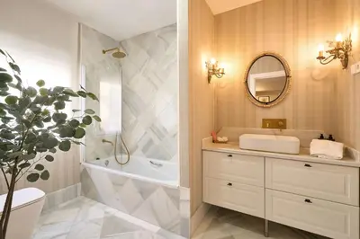 Un baño de Apartamentos BEJAR - MUSGO