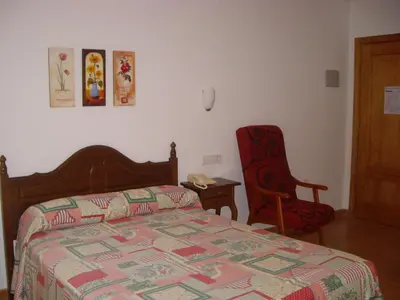 Cama o camas de una habitación en Hotel La Glorieta
