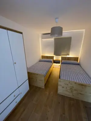Cama o camas de una habitación en El 42 MIJARES