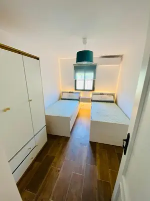 Cama o camas de una habitación en El 42 MIJARES