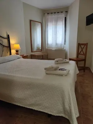Cama o camas de una habitación en Hotel la Hoja***